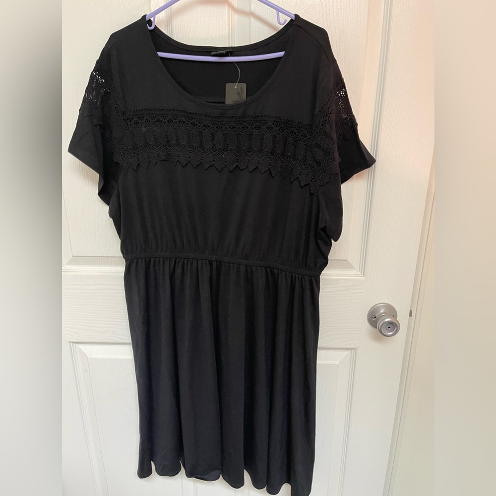 Torrid, black knit fit and fare dress, with lace detail, size 2